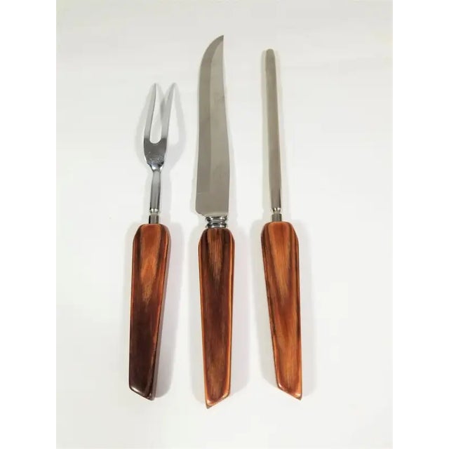 Never used and still in original box. Mid Century cutlery set made in England by Sheffield. Rosewood handles. Stainless...