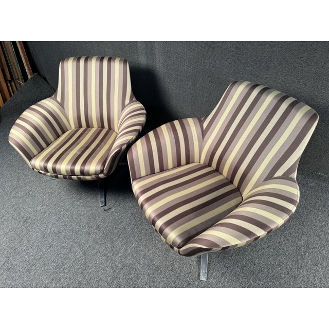 Coalesse "Bob" Chairs by Brayton International. A well-crafted beauty featuring flared arms, a polished aluminum base and...