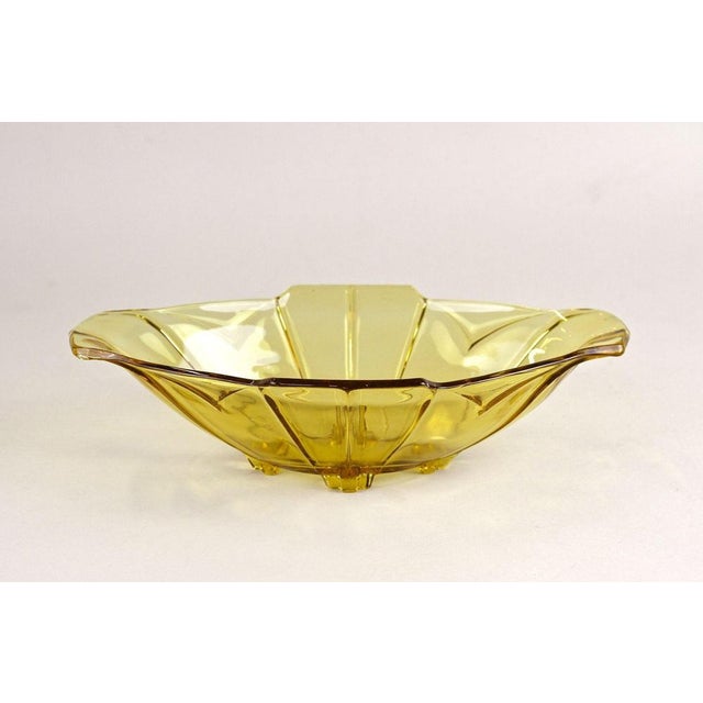 Lovely amber colored Art Deco glass jardiniere or glass bowl from the period around 1920 in Austria. Showing a fantastic...