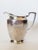 Lovely hammered silver pitcher, perfect for water or iced tea. It has a great shaped handle with a flared end and a large...