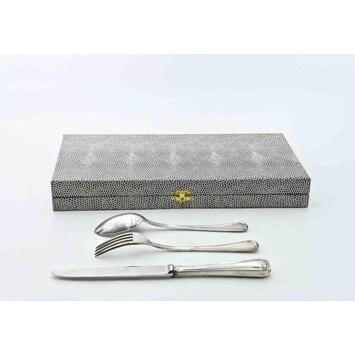 A charming three-piece Italian child’s cutlery set, crafted in 800 silver, comprising a spoon, fork, and knife in an...