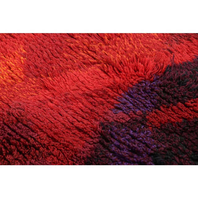 Hand-knotted in lush, high-pile wool in Sweden circa 1960-1970, this 3x4 vintage Swedish Rya rug is a bold new addition to...