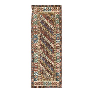Early 20th Century Handmade Caucasian Kazak Runner with a Tribal Design For Sale