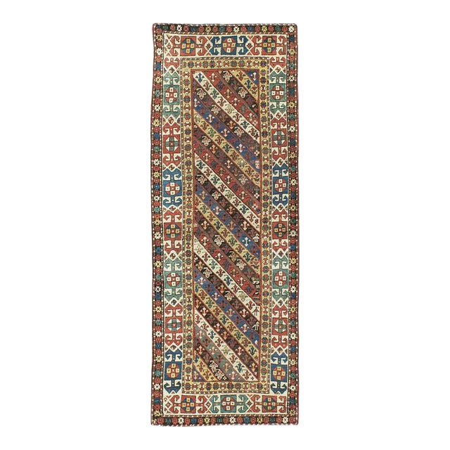Early 20th Century Handmade Caucasian Kazak Runner with a Tribal Design For Sale