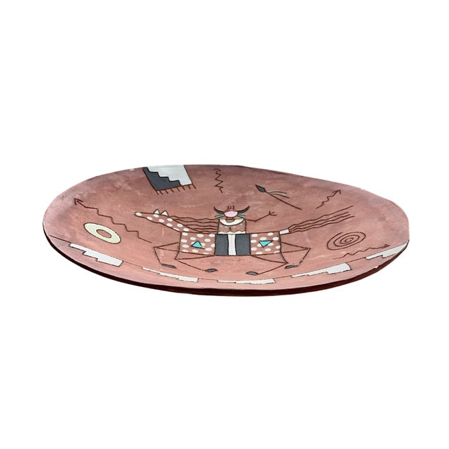 Handcrafted and hand-painted ceramic bowl by Red Clay Horse Co., dated 1989, featuring a stylized horse and rider rendered...