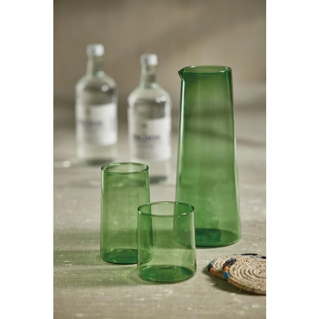 This pitcher is made from quality, durable glass and is a beautiful addition to any kitchen or dining room. It has a wide...