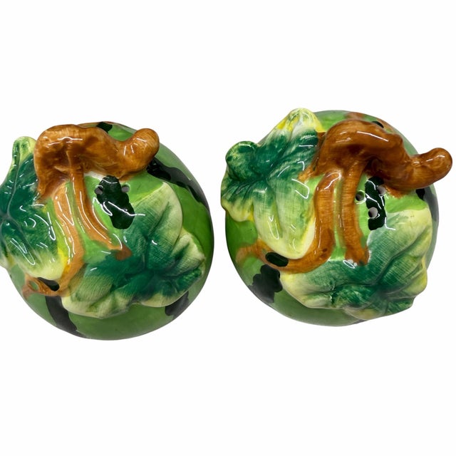 Vintage watermelon salt and pepper shakers. Each measures 3” diameter x 3.5” h. No cracks, chips or crazing.