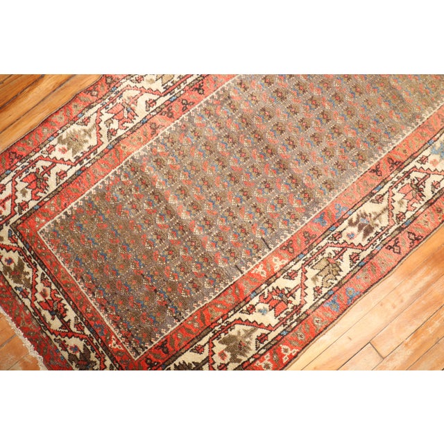 Early 20th-century Persian Malayer rug in predominantly brown Measures: 3' x 17'10''