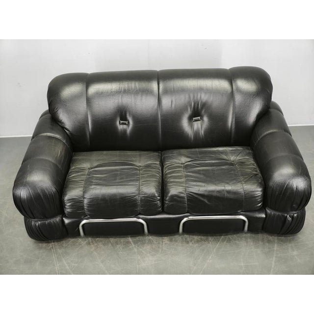 A striking two-seat sofa designed by Adriano Piazzesi in Italy during the 1970s. This sculptural piece exemplifies the...