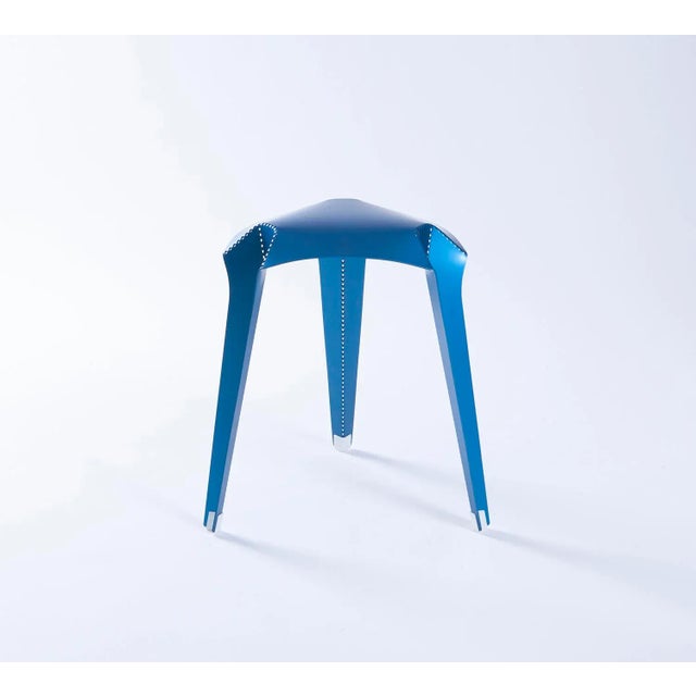 The nature of the material is a series of stackable furniture. Each object is folded from a spread of a laser-cut aluminum...