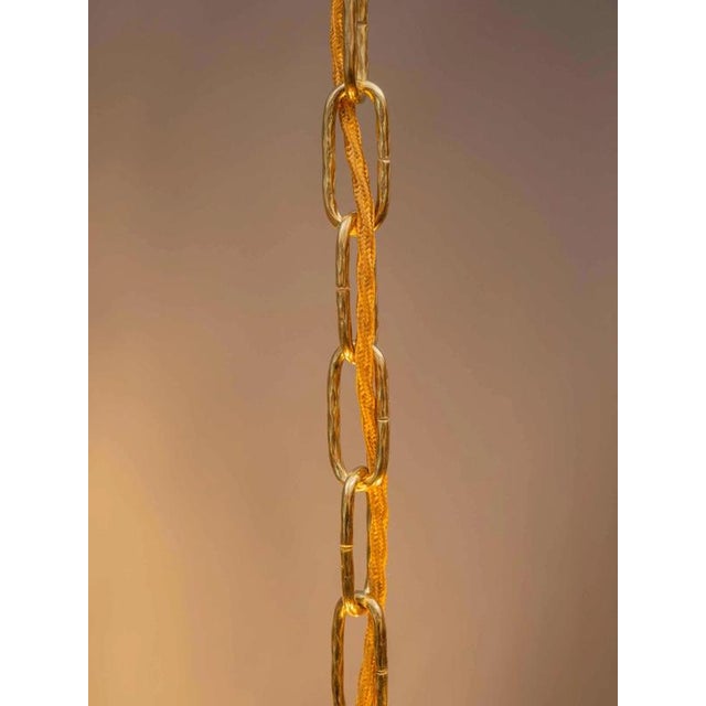 This beautiful chandelier is another example of excellent craftsmanship and aesthetic design that enlivens the space with...