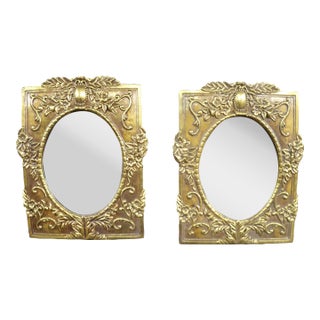 Pair of Italian Syroco Gold Wall Mirrors With Floral Relief For Sale