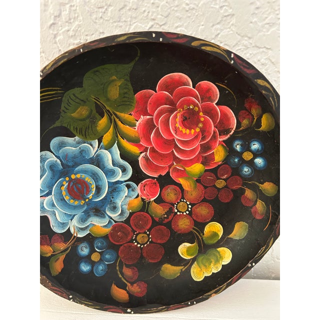 Vibrant Mexican mid-century hand-painted round carved wood Batea bowl in a floral motif.