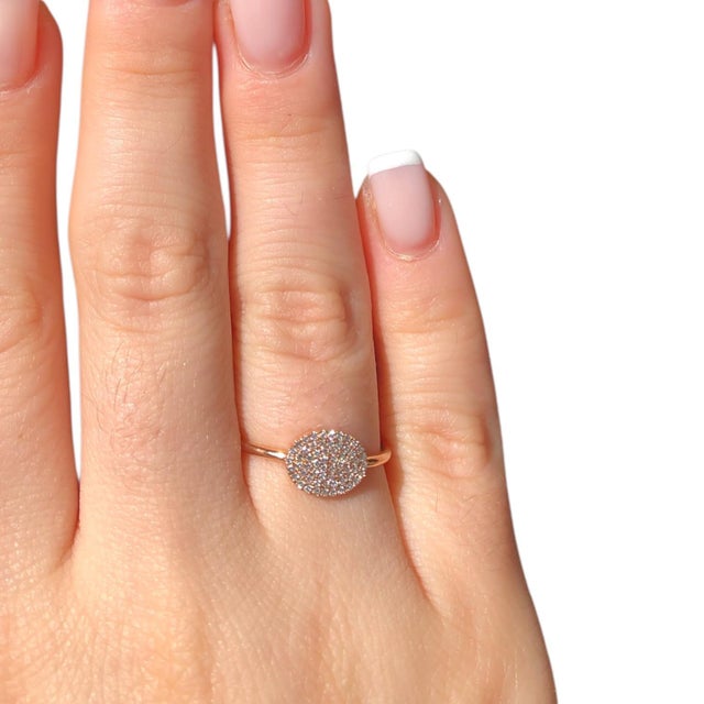 Elevate your jewelry collection with this exquisite 14k rose gold ring, a stunning piece that beautifully combines...