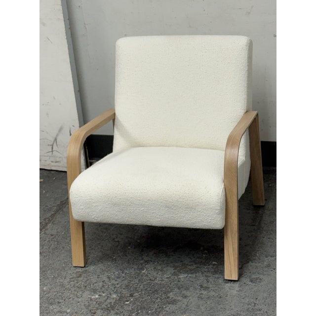 Design Plus Gallery presents a Bespoke Felix Chair in Performance Bouclé Polar. This lounge chair is upholstered in an...