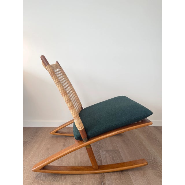 Fredrik A. Kayser (1924-1968) for Vatne Møbler model #599 teak rocking chair. Norway, 1960. Material is teak, cane, with a...