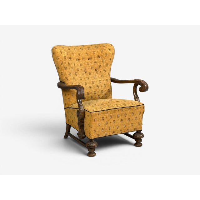 Scandinavian Modern, Lounge or Arm Chair, Carved Wood, Fabric, Denmark, 1960s A heavily carved Scandinavian lounge chair...