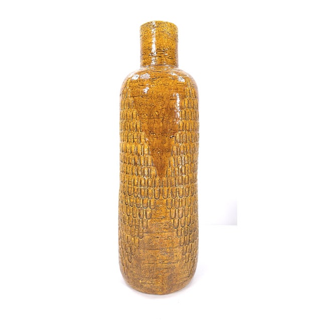 Tall and charming mid-century vase that would make a nice statement on any table. Marked "4572 ITALY"