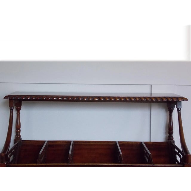 English Mahogany Bookcase with upper scalloped shelf, and faux bamboo stretchers. Top scalloped shelf 36"W x 9" D. Cross...