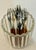 A stylish set of nine vintage Japanese cocktail/appetizer forks featuring polished stainless steel heads and warm wooden...