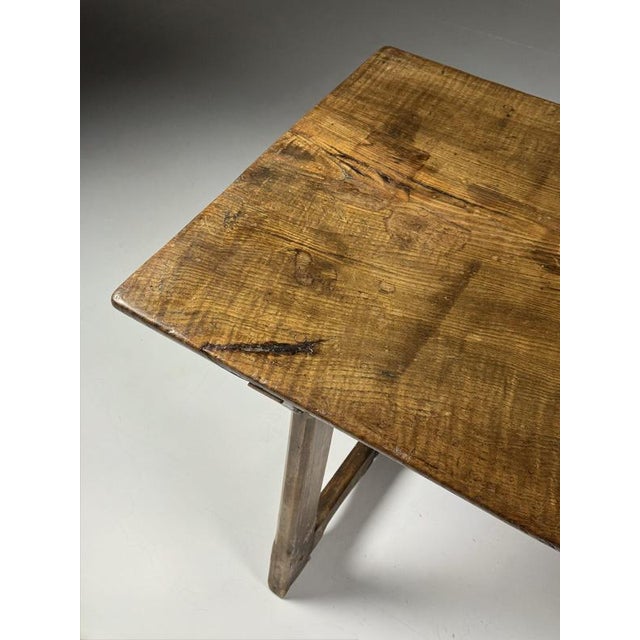 Large Spanish table. Top consisting of two planks; virtually invisible at first glance, it appears to be one wide plank....