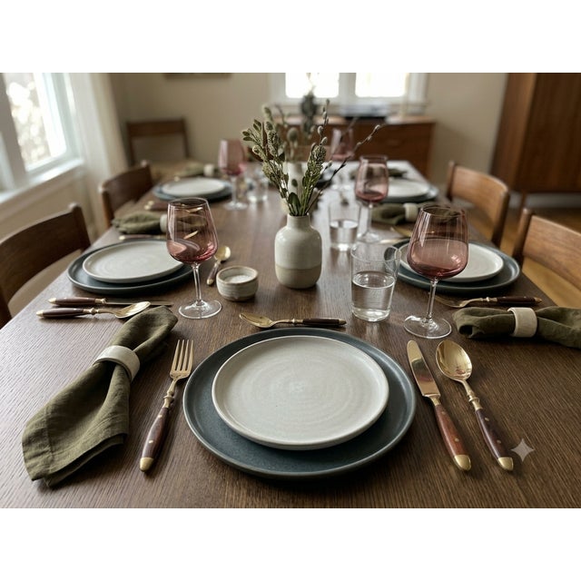 Exquisite Mid-Century Craftsmanship Add a touch of modernist vintage charm to your table with this exceptional 24-piece...