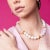 Elevate your style with the Leah Necklace, adorned with medium oval shell pearls in a vintage and classic design. This...