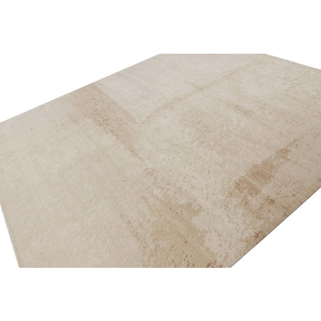 Hand knotted in wool and silk, 9x12 modern rug “Symmetry No. 04” hails from our Artist Collaboration collection, named for...