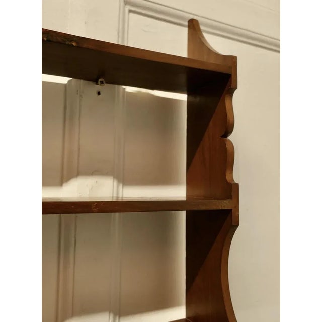 Arts and Crafts Open Front Wall Hanging Yew Bookshelf This superb quality bookcase has 4 open shelves and a carved...