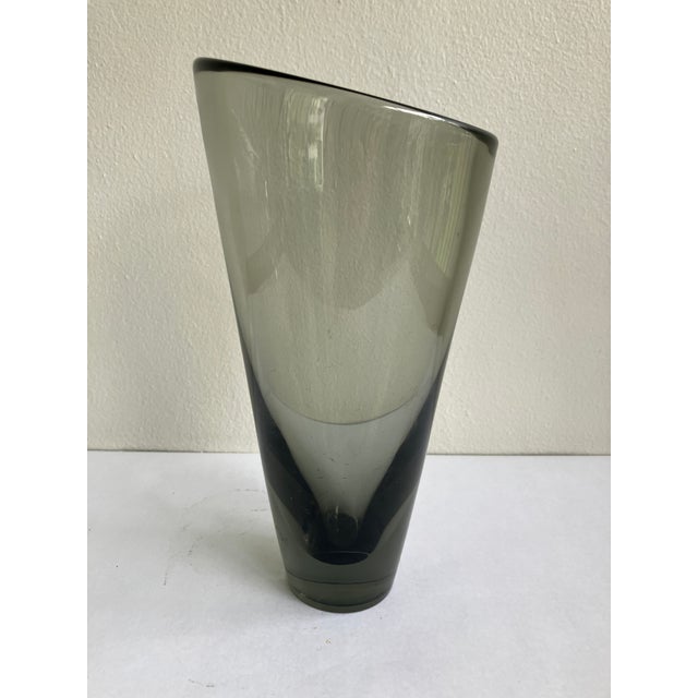 This is really lovely Danish modern grey glass vase by Per Lutken for Holmegaard. The piece is signed on the base and...