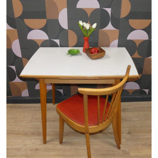 Practically extendable, small kitchen table Beautifully crafted in excellent condition Ideal for small kitchens A stylish...
