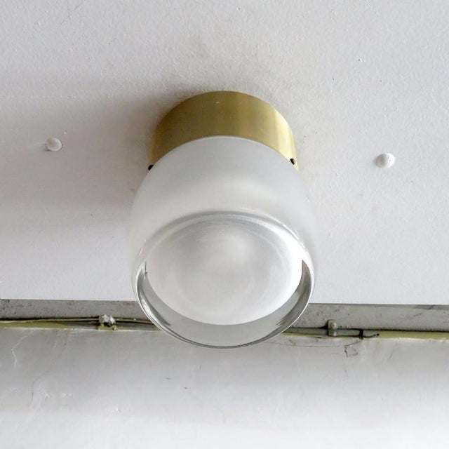 wonderful flush mount lights by Staff Leuchten, Germany, brushed brass colored aluminum and heavy molded glass, etched on...