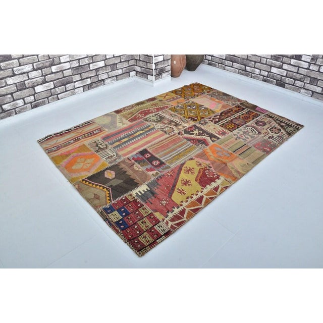 Textile Vintage Handwoven Turkish Patchwork Kilim Rug With Eclectic Tribal Motifs For Sale - Image 7 of 9