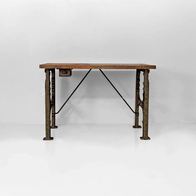 Italian industrial wooden and cast iron console, 1800s Industrial-style console table with a rectangular solid wood top...