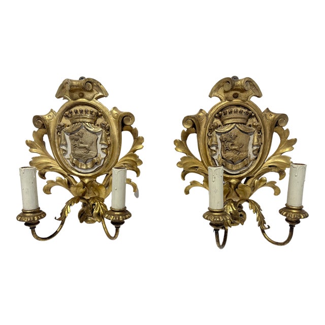 French Rococo Giltwood Armorial Two-Light Wall Sconces, 19th Century For Sale