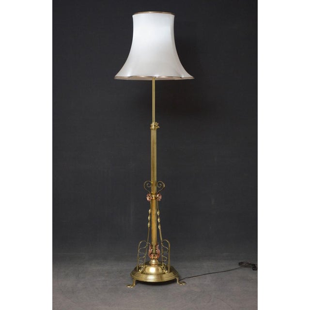 Superb Late Victorian / Art Nouveau brass and copper height adjustable standard lamp, having reeded column with twisted...