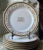 A stunning discovery from the brocantes of Paris! This exquisite set of six antique Limoges porcelain dinner plates...