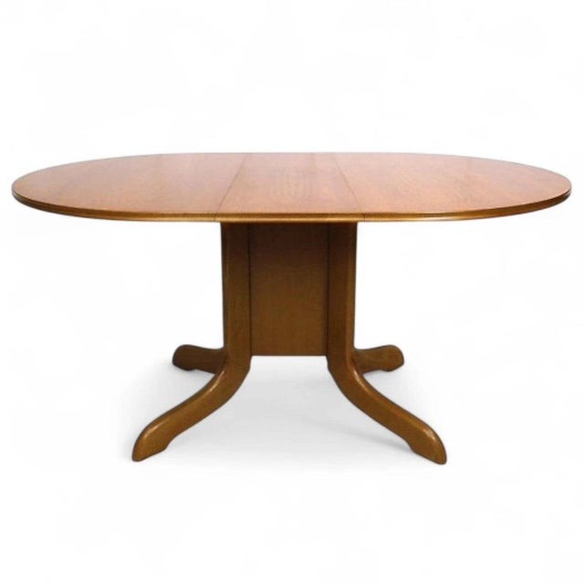 This drop leaf dining table from morris of glasgow is a perfect blend of style and function, designed to enhance your...