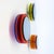 The mirror object float in front of the wall and creates a fascinating sculpture full of positive energy through color,...