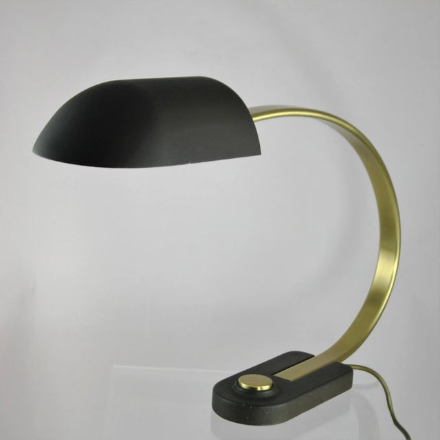 The beautiful and rare lamp is a real design classic from Hillebrand. This light in unusual design is a highlight for...