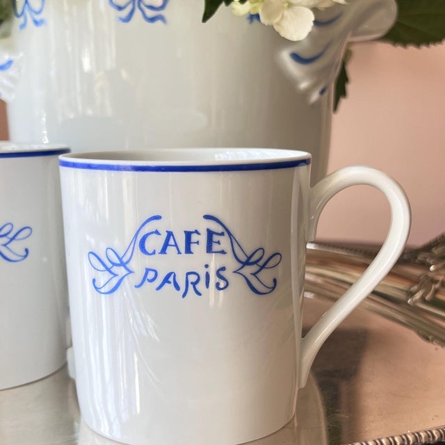 This is a beautiful pair of Bernardaud Limoges coffee mugs in the hard-to-find "Cafe Paris" pattern. This luxury brand is...