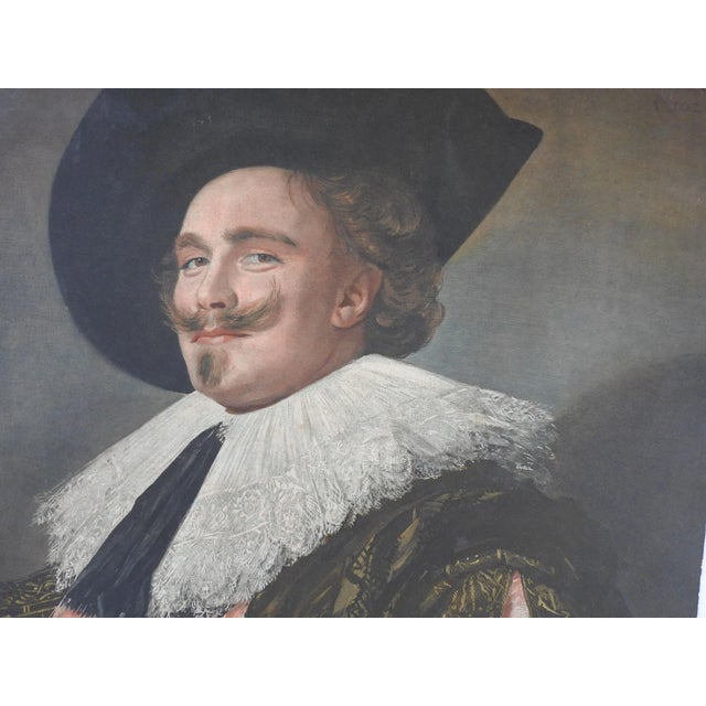 Early 20th century lithograph print of Franz Hals The Laughing Cavalier. Printed on heavy cardstock, matte finish with...