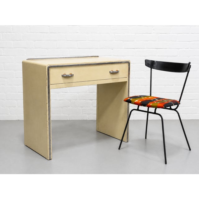 Mid Century Modern with an art deco vibe, this desk by Simmons Furniture Company, c. 1950’s embodies the Machine Age...