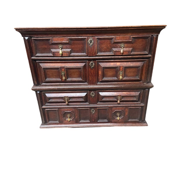 The chest is all original as can be seen in the pictures, the back has single piece panels.