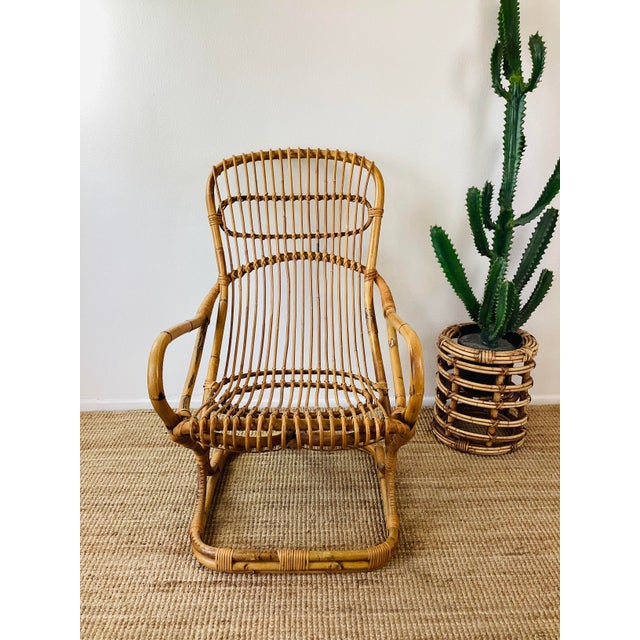 Vintage 1960s Rattan Chair by Tito Angoli made of rattan natural honey color sturdy curved frame mid century Italian...