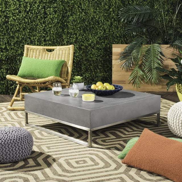 Effortlessly chic, this contemporary concrete indoor outdoor coffee table is beloved by architects. Designed for value and...