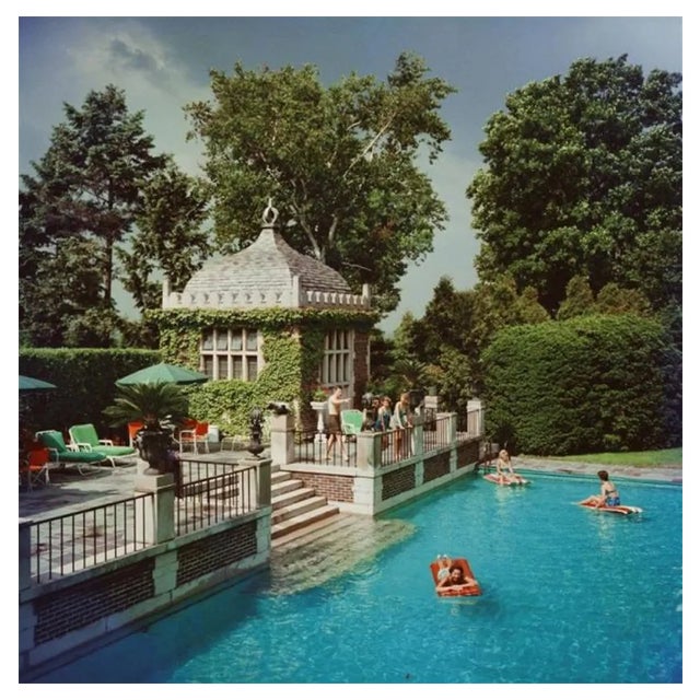 Slim Aarons, Family Pool in Florida, Estate Stamped Photographic Print, 1960 / 2020s For Sale
