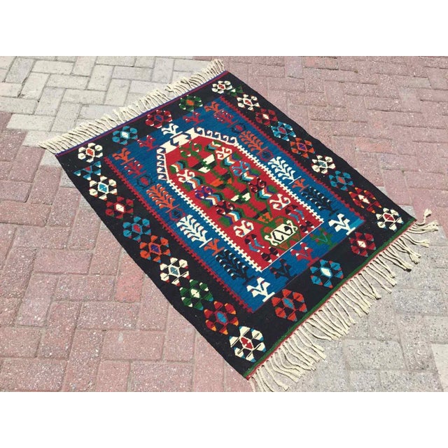 This beautiful, vintage, handwoven kilim is approximately 60 years old. It is handmade of very fine quality, hand-spun...