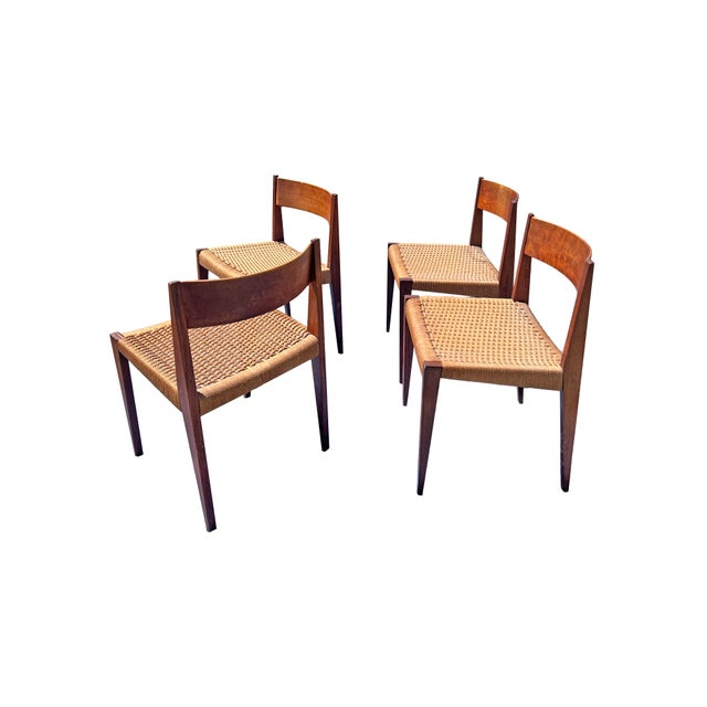 Vintage Mid Century Modern Teak Danish Dinging Chairs With Rattan Paper Cord Rope Seating Set of 4 Highly desired designer...