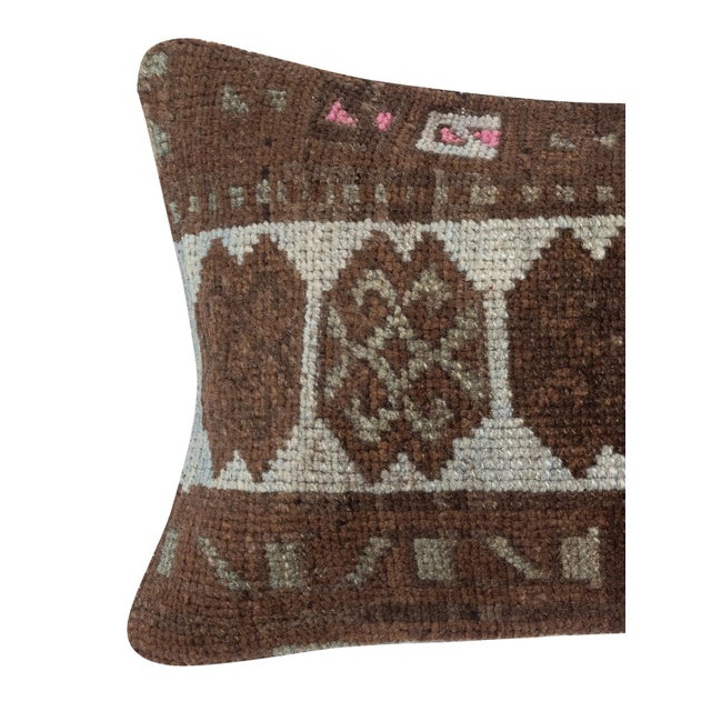 Add a touch of history and warmth to your space with this vintage handmade Turkish wool rug cushion cover. Crafted from...